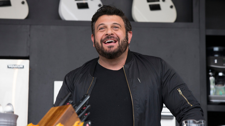 Adam Richman with knives