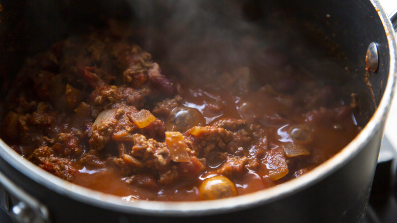 Heating chili in a pot