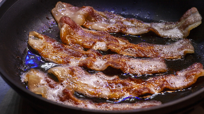 Bacon frying in pan