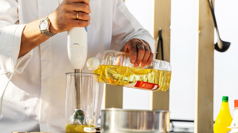 Pouring oil for mayonnaise