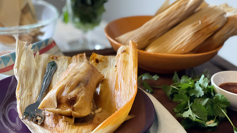 chile and cheddar tamale on plate and in bowl