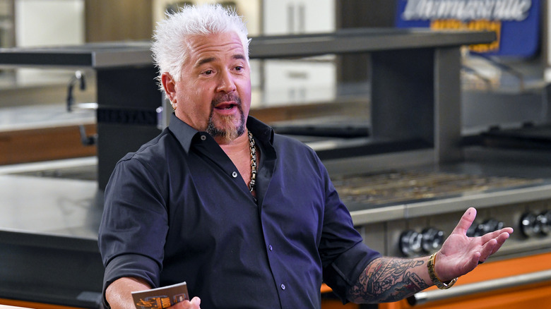 Guy Fieri talks on set