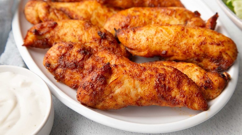 bbq chicken tenders on plate with ranch