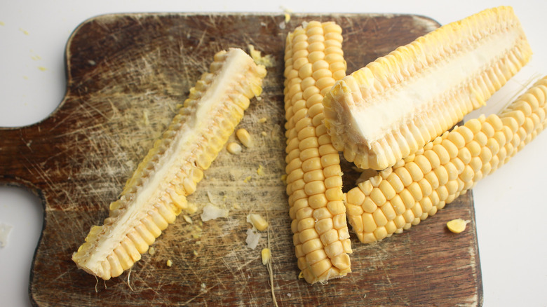 sliced corn on cutting board 