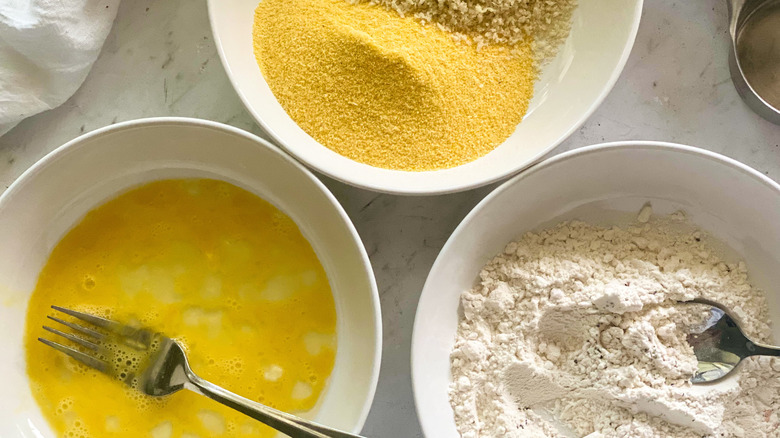 bowls of breading ingredients