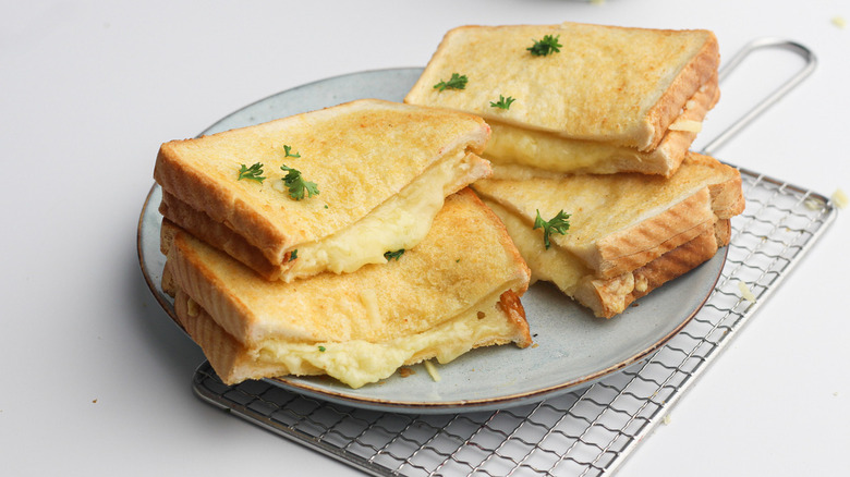 grilled cheeses on plate