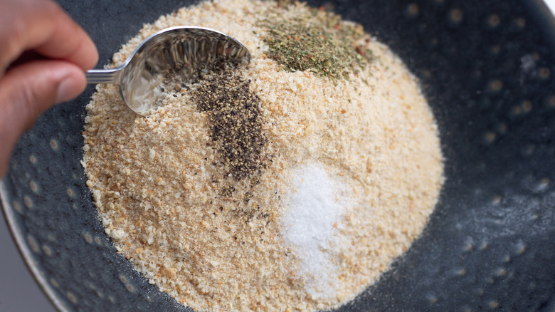 measuring out the seasonings for Air Fryer Mozzarella Sticks