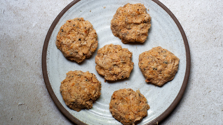 shaped Salmon patties on a plate