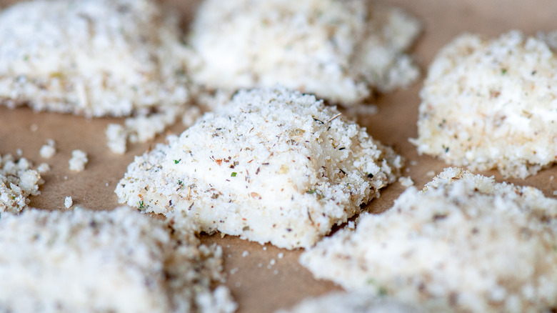 breadcrumb-coated ravioli on tray