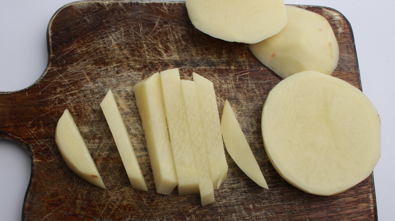 potatoes on a cutting board