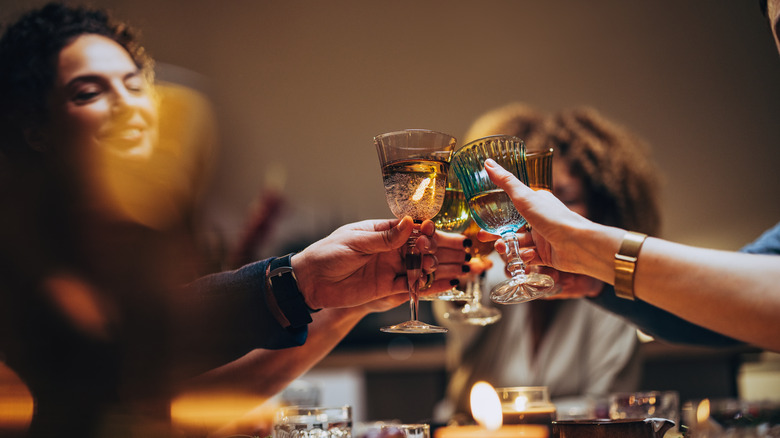 Friends cheering with alcohol 