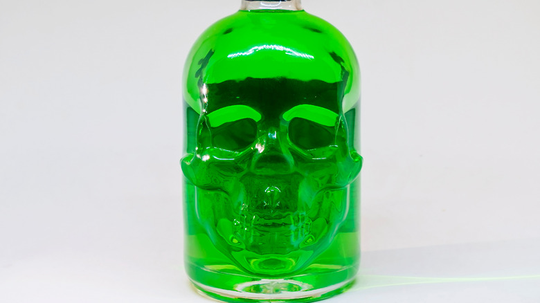 Absinthe in skull-shaped bottle