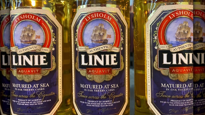 Trio of aquavit bottles in row