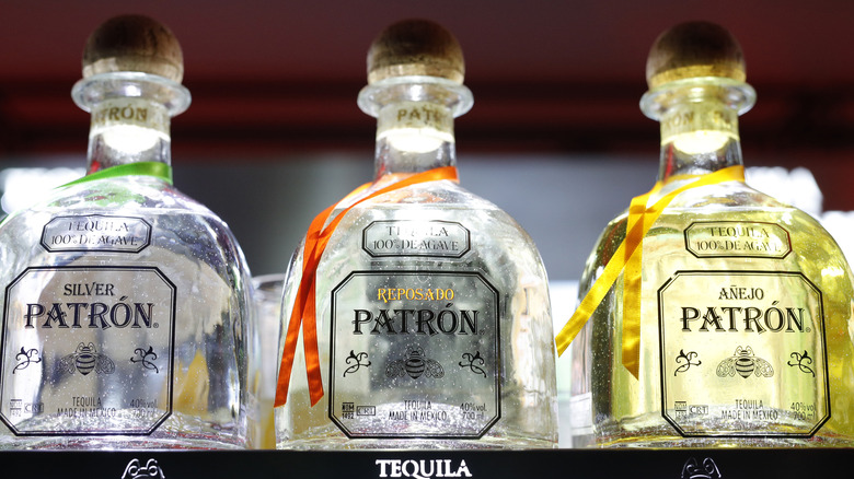 Trio of backlit tequila bottles 