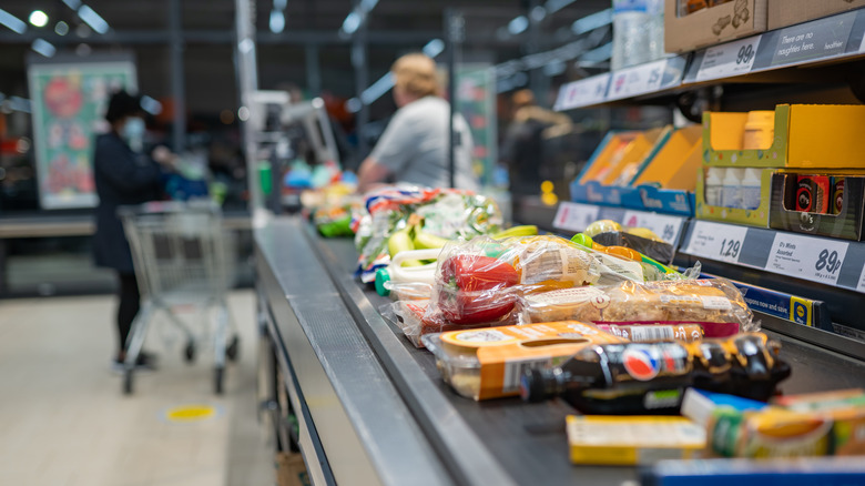 groceries lined on belt