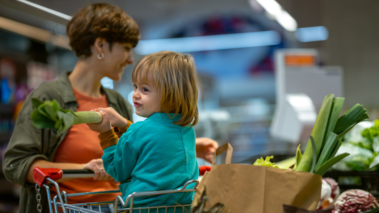 mother shopping with child