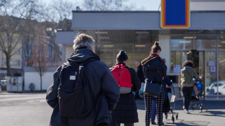 Line of customers outside Aldi