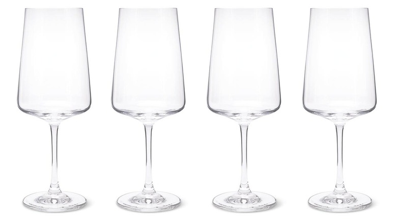 Four empty Crofton wine glasses