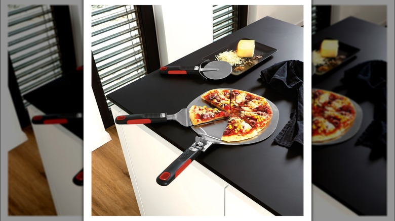 Pizza with kitchenware