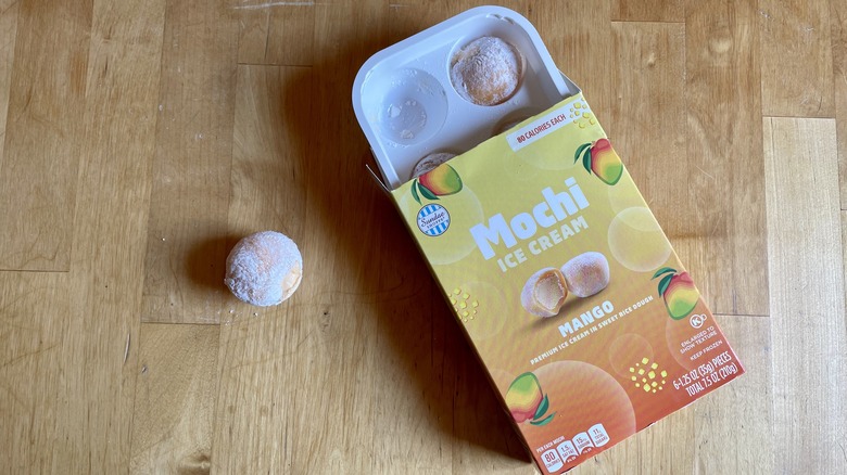 mango mochi package with a mochi on side