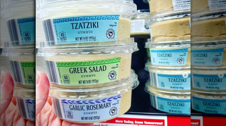 Packages of Aldi's Greek hummus