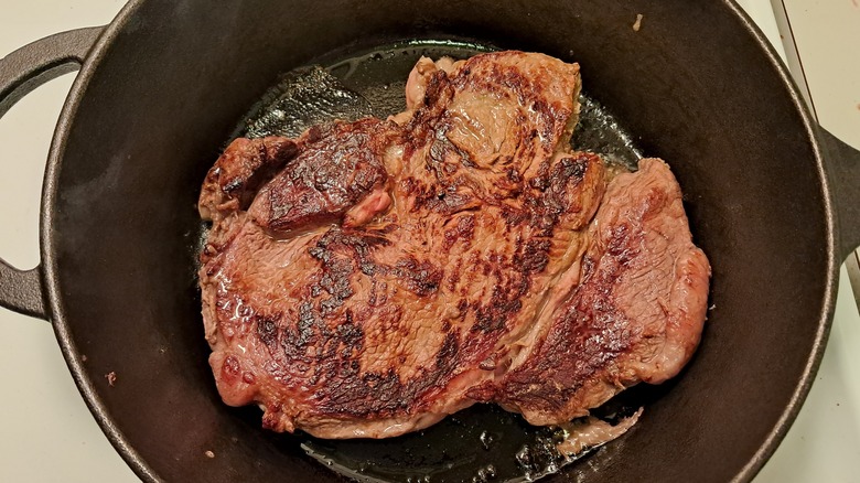 Top round steak in pan