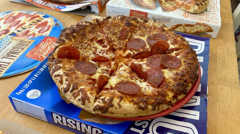 whole pepperoni pizza on box