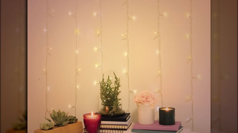 LED string lights behind candles