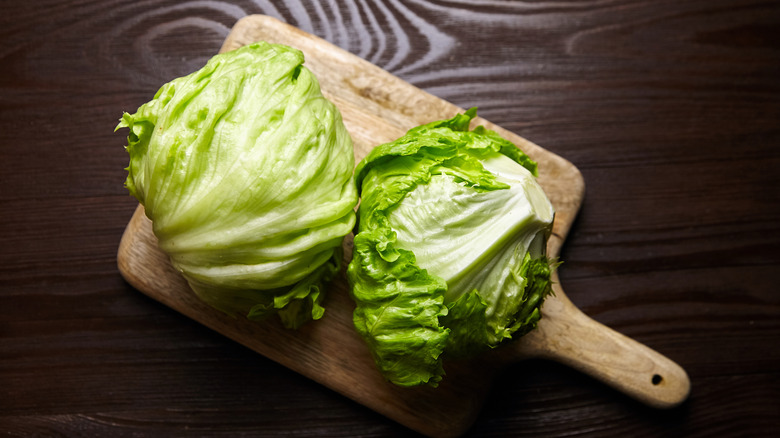 iceberg lettuce on cutting board