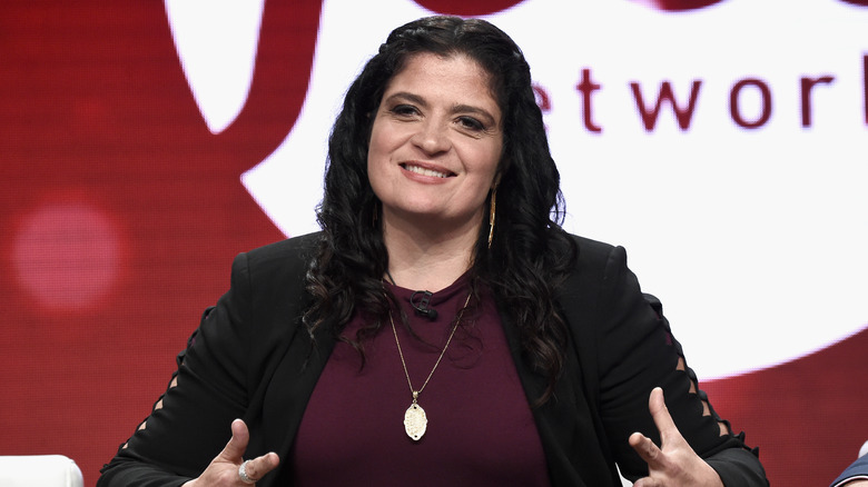 Alex Guarnaschelli in a black jacket