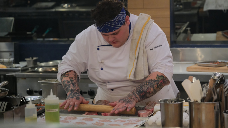 Alex Najar cooking on Hell's Kitchen