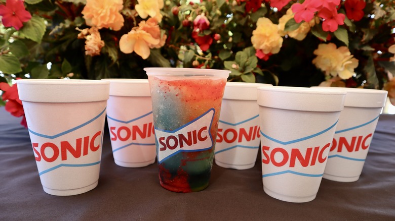 Sonic drinks with flower background