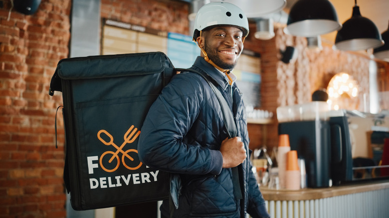 man with food delivery backpack