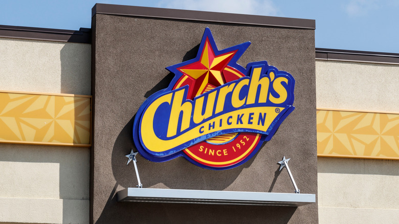 Church's Chicken restaurant sign on building