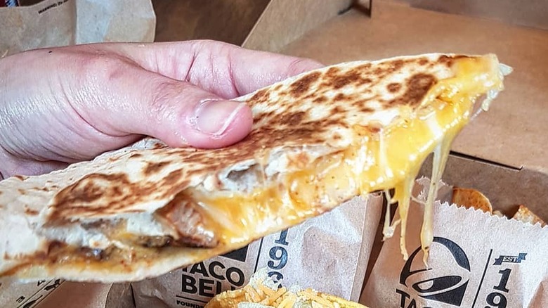 Cross-section of quesadilla in hand