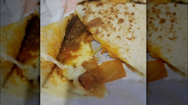 Kimchi quesadilla with filling shown