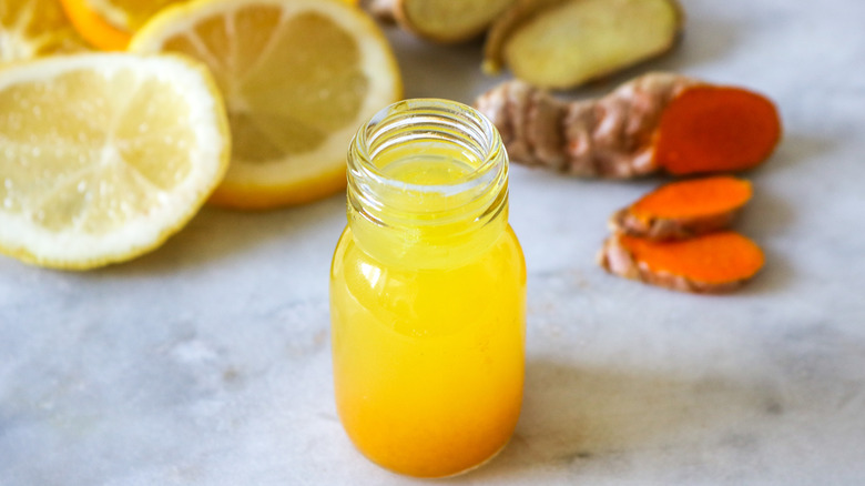 health juice shot in glass bottle