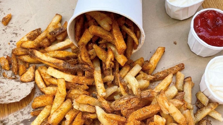 fries spilled out of cup