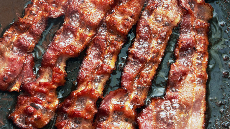 fried bacon on grill