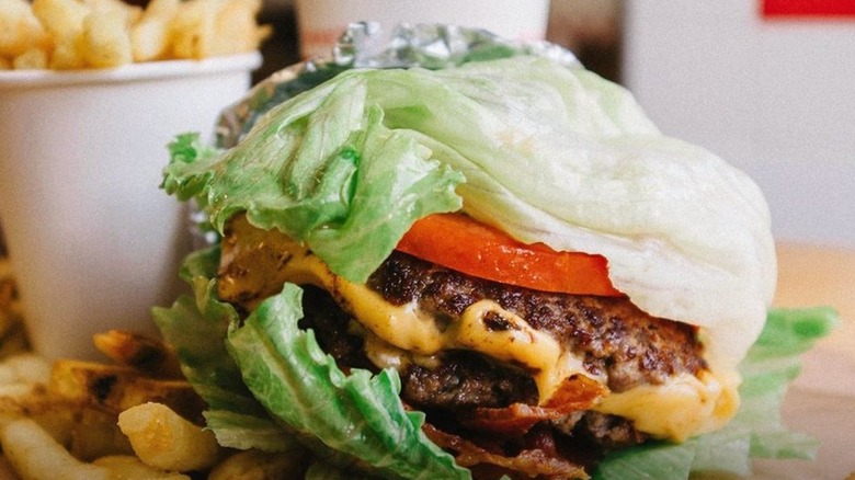 lettuce wrapped burger with fries