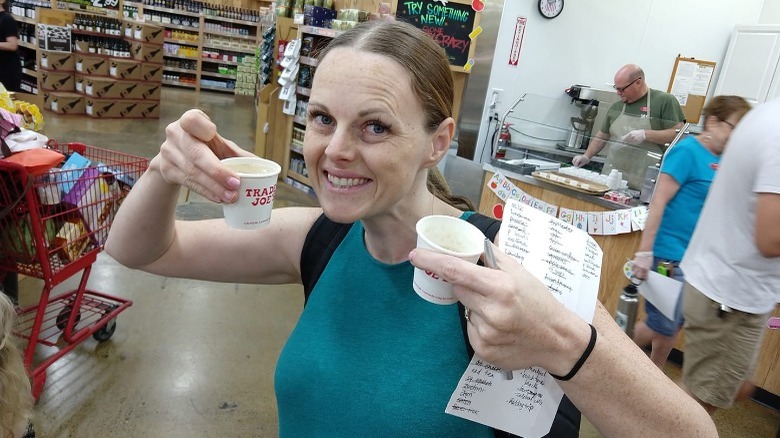 lady enjoying Trader Joe's samples