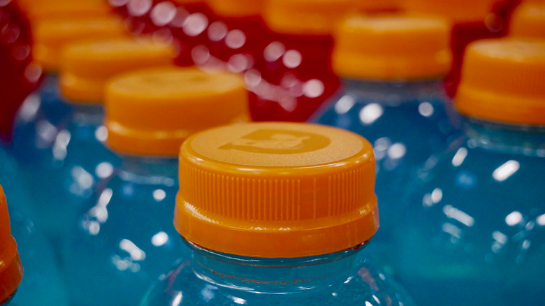 close up of caps on blue gatorade bottles