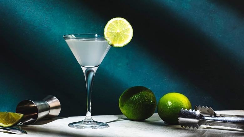 martini with lime garnish