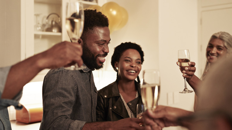 people enjoying champagne