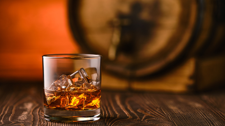 whiskey glass with barrel