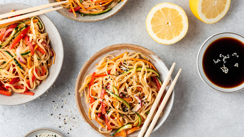 Bowls of pasta and sauce