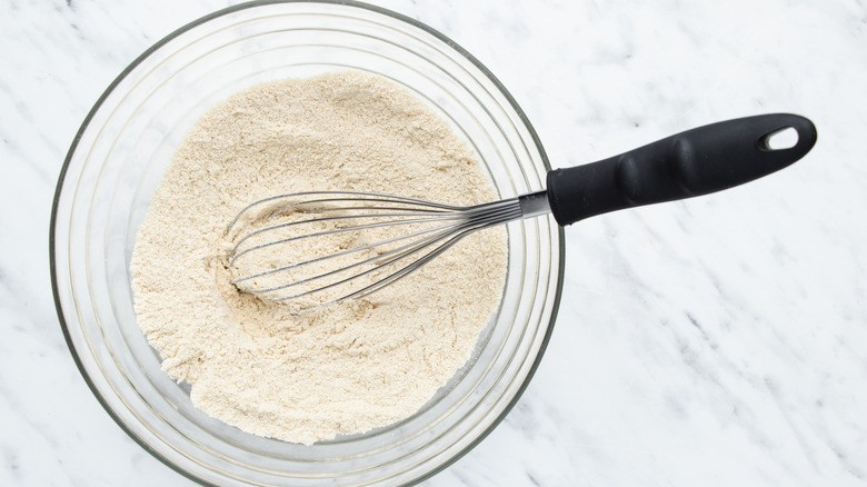 flour and baking soda in bowl