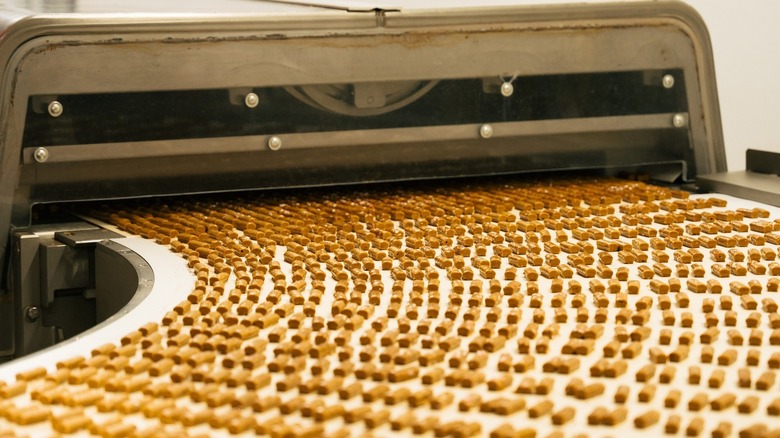 almond roca on a conveyor belt