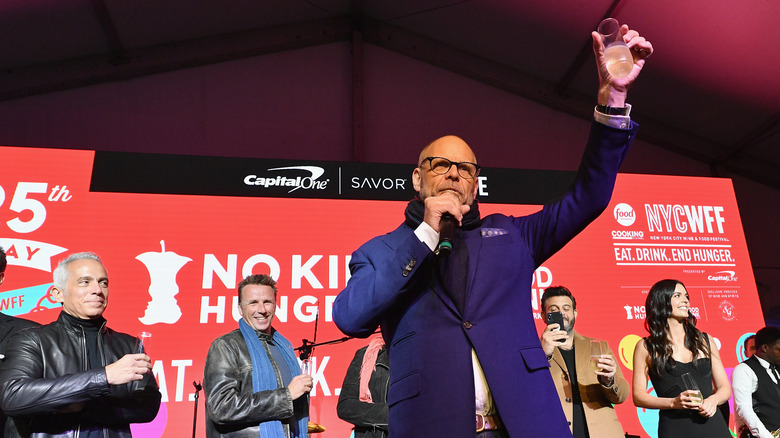 Alton Brown making a toast