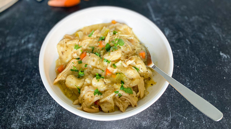 Chicken and dumplings in a bowl